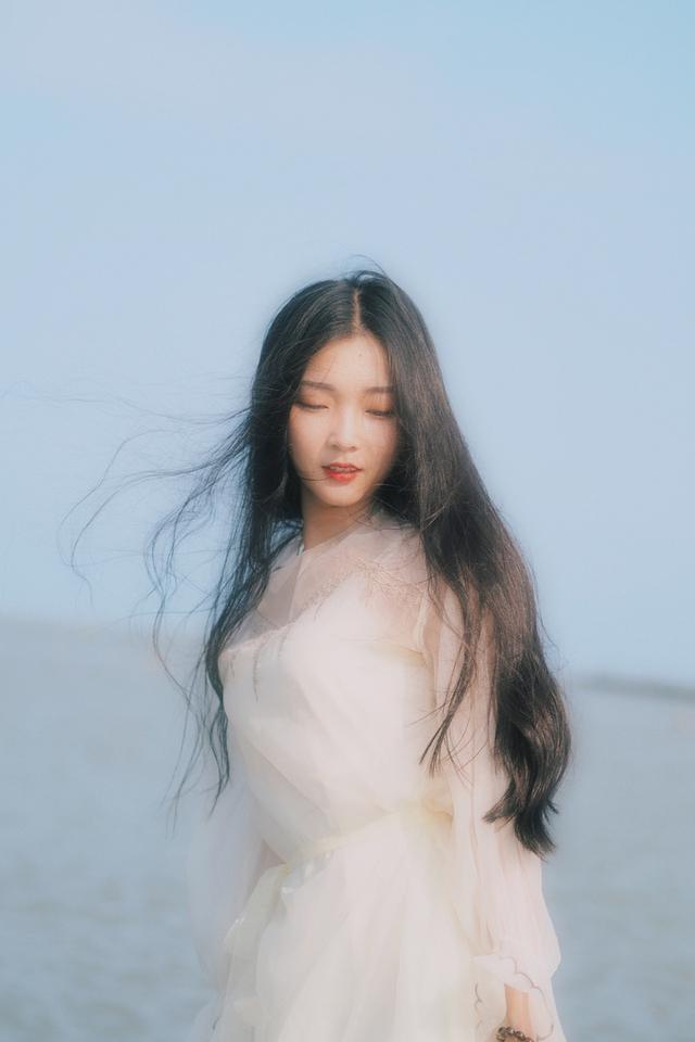 一組海邊舞女寫真，似80年代港星